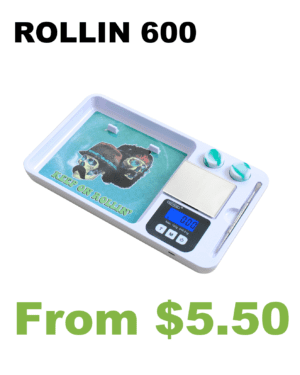 A Rollin100 Rolling Tray Digital Pocket Scale on a white plate.