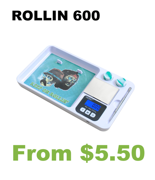 A Rollin100 Rolling Tray Digital Pocket Scale on a white plate.