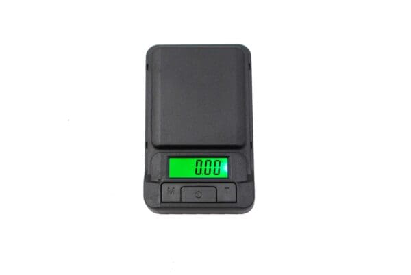 Black digital scale with green display.