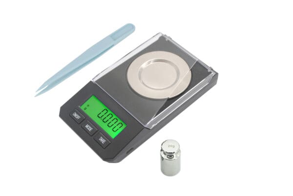 A VBN 50 Milligram Scale with a pen and a toothpick.