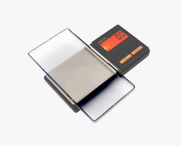 A VLT 1000 Classic Digital Pocket Scale sitting on top of a white surface.