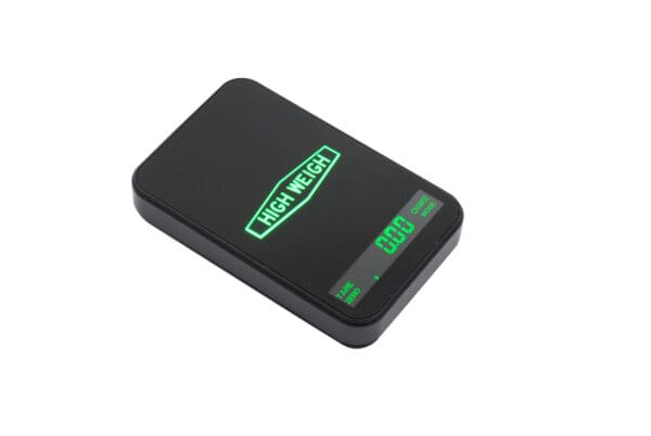A black VMU 100 Touch Series Digital Pocket Scale with a green light on it.