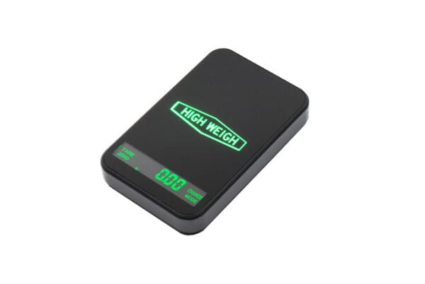 A black VMU 100 Touch Series Digital Pocket Scale with a green light on it.