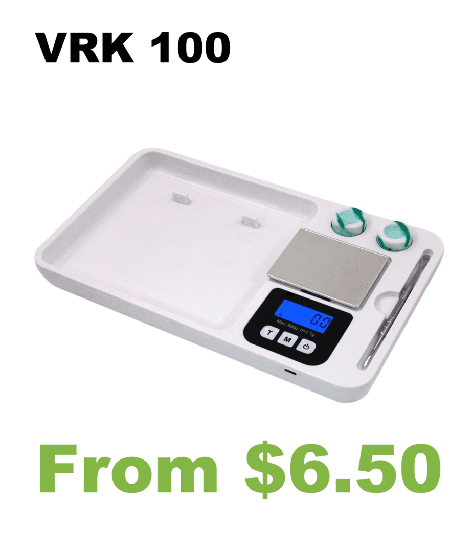 The Rollin100 Rolling Tray Digital Pocket Scale is on top of a white plate.