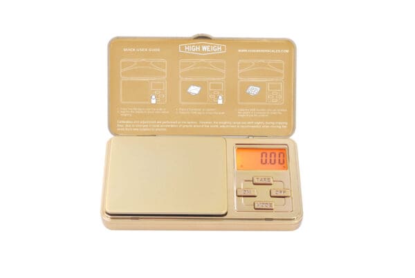 A VDP 150 Chrome Gold Digital Pocket Scale with a box.