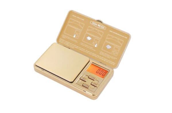 A VDP 150 Chrome Gold Digital Pocket Scale with a box on it.