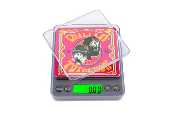 A Chillin 200 Digital Pocket Scale with a picture of a clown sitting on top of it.