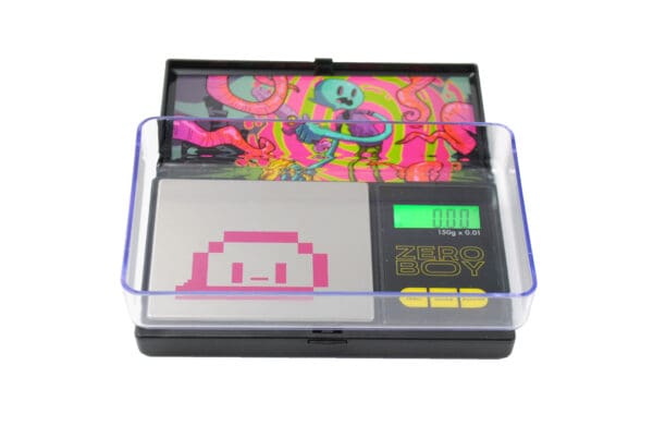 A pink pixelated ZERO BOY 150 Digital Pocket Scale with a pixelated character on it.